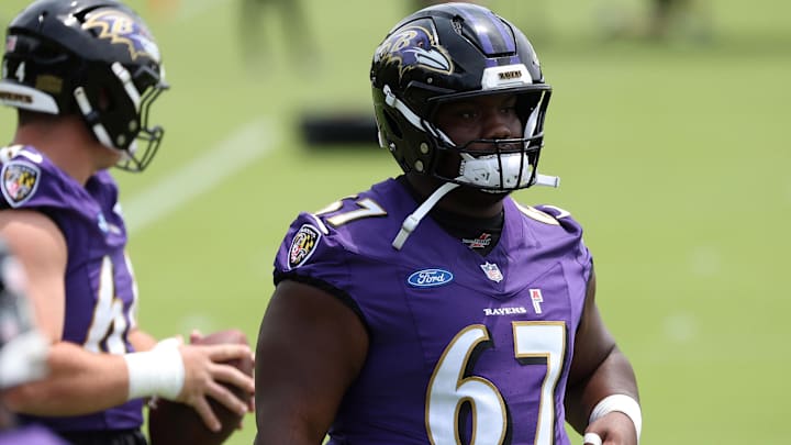 Jun 10, 2025; Baltimore, MD, USA; Baltimore Ravens offensive tackle Corey Bullock (67) looks on during an NFL OTA at Under Armour Performance Center. Mandatory Credit: Daniel Kucin Jr.-Imagn Images