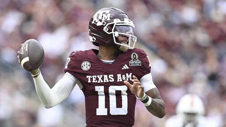 Dec 20, 2025; College Station, TX, USA; Texas A&M Aggies quarterback Marcel Reed (10) looks to pass during the first half of the first round game of the CFP National Playoff against the Miami Hurricanes at Kyle Field. Mandatory Credit: Maria Lysaker-Imagn Images Dec 20, 2025; College Station, TX, USA; Texas A&M Aggies quarterback Marcel Reed (10) looks to pass during the first half of the first round game of the CFP National Playoff against the Miami Hurricanes at Kyle Field. Mandatory Credit: Maria Lysaker-Imagn Images