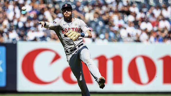 Sep 15, 2024; Bronx, New York, USA; Boston Red Sox shortstop Trevor Story (10) throws to first in the 1st inning against the New York Yankees at Yankee Stadium. Mandatory Credit: Wendell Cruz-Imagn Images Sep 15, 2024; Bronx, New York, USA; Boston Red Sox shortstop Trevor Story (10) throws to first in the 1st inning against the New York Yankees at Yankee Stadium. Mandatory Credit: Wendell Cruz-Imagn Images