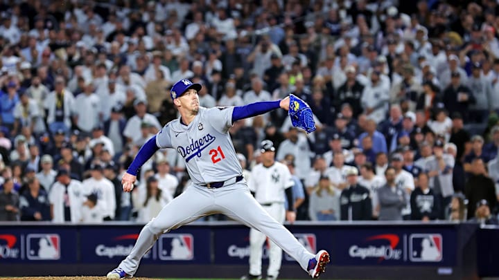 Oct 30, 2024; New York, New York, USA; Los Angeles Dodgers pitcher Walker Buehler (21) pitches during the ninth inning against the New York Yankees in game four of the 2024 MLB World Series at Yankee Stadium.