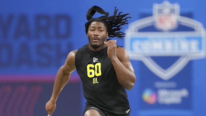 Oklahoma defensive lineman R Mason Thomas (DL60) runs the 40-yard dash during the NFL Scouting Combine at Lucas Oil Stadium. Oklahoma defensive lineman R Mason Thomas (DL60) runs the 40-yard dash during the NFL Scouting Combine at Lucas Oil Stadium.