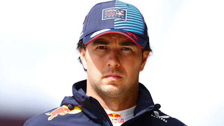 19th placed qualifier Sergio Perez of Mexico and Oracle Red Bull Racing walks in the Pitlane during qualifying ahead of the F1 Grand Prix of Great Britain at Silverstone Circuit on July 06, 2024 in Northampton, England.