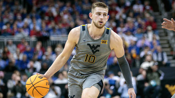 Mar 9, 2023; Kansas City, MO, USA; West Virginia Mountaineers guard Erik Stevenson (10) moves to the basket during the second half against the Kansas Jayhawks at T-Mobile Center. 