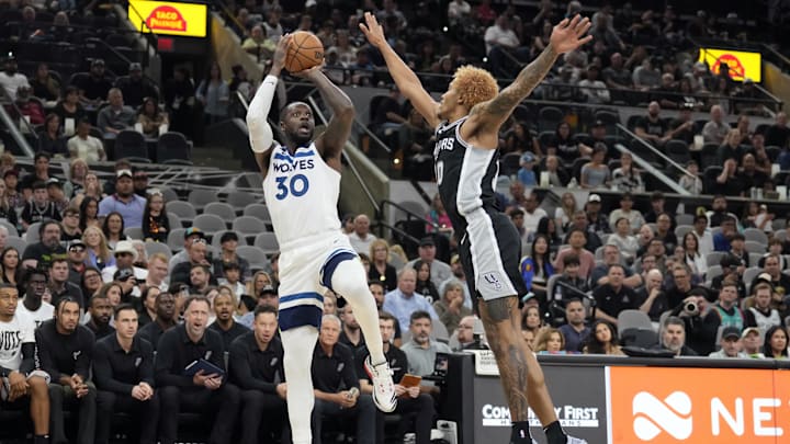 Minnesota Timberwolves forward Julius Randle (30) shoots over San Antonio Spurs forward Jeremy Sochan during the first half at Frost Bank Center in San Antonio, Texas, on Nov. 2, 2024. 