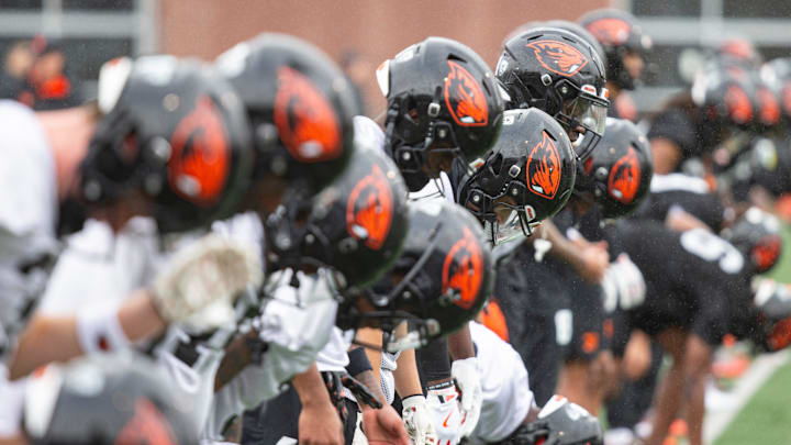 Oregon State players stretch during the first day of spring practice at the Tommy Prothro Football Complex on Tuesday, March 4, 2025, in Corvallis, Ore.