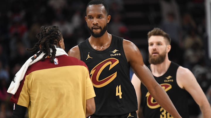 Mar 14, 2025; Memphis, Tennessee, USA; Cleveland Cavaliers power forward Evan Mobley (4) celebrates with teammates after making a three-pointer in the 1st quarter of the Cleveland Cavaliers vs. Memphis Grizzlies at FedExForum. Mandatory Credit: Matthew Smith-Imagn Images