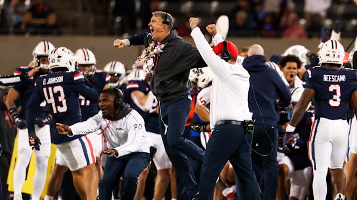 Nov 15, 2024; Tucson, Arizona, USA; Arizona Wildcats head coach Brent Brennan celebrates a interception made against the Houston Cougars during the second quarter at Arizona Stadium. Mandatory Credit: Aryanna Frank-Imagn Images