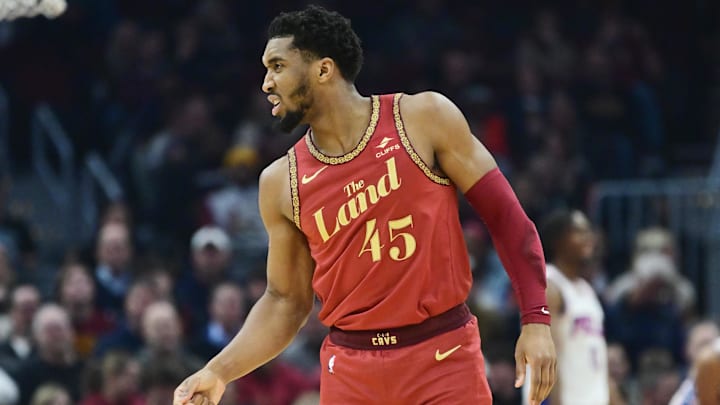 Feb 12, 2024; Cleveland, Ohio, USA; Cleveland Cavaliers guard Donovan Mitchell (45) reacts after a play during the first half against the Philadelphia 76ers at Rocket Mortgage FieldHouse. Mandatory Credit: Ken Blaze-Imagn Images