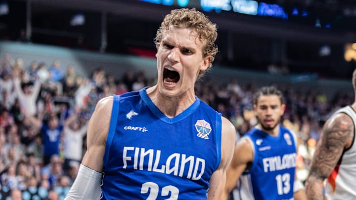 Lauri Markkanen of Finland celebrates a score during the...