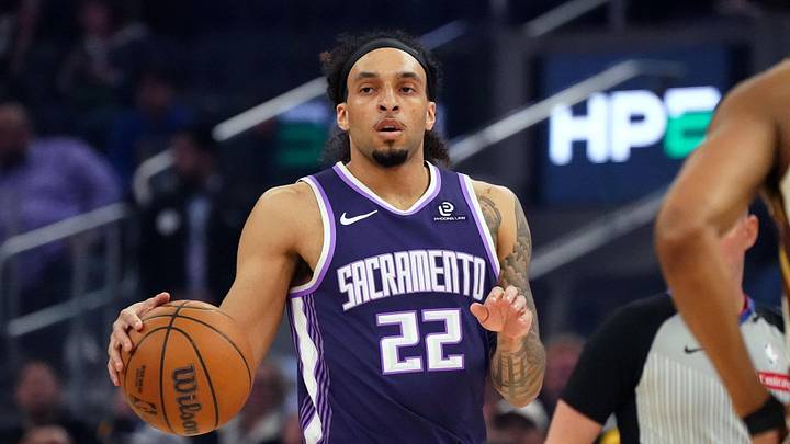 Apr 7, 2026; San Francisco, California, USA;  Sacramento Kings guard Devin Carter (22) dribbles upcourt against the Golden State Warriors in the first quarter at Chase Center.