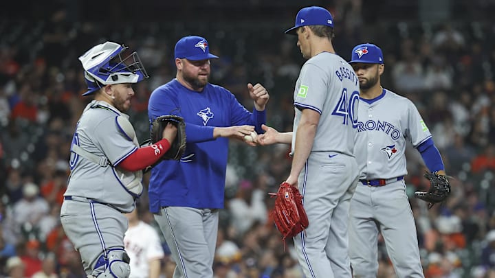 Apr 3, 2024; Houston, Texas, USA; Toronto Blue Jays starting pitcher Chris Bassitt (40) hands the