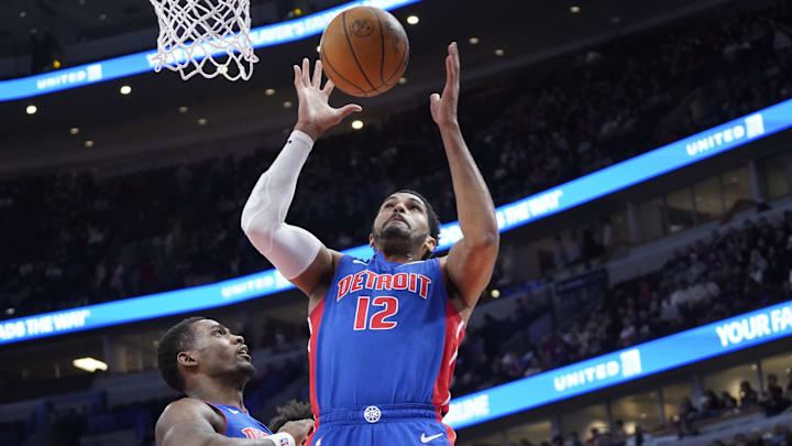 Feb 11, 2025; Chicago, Illinois, USA; Detroit Pistons forward Tobias Harris (12) gets a rebound against the Chicago Bulls during the first quarter at United Center. Mandatory Credit: David Banks-Imagn Images