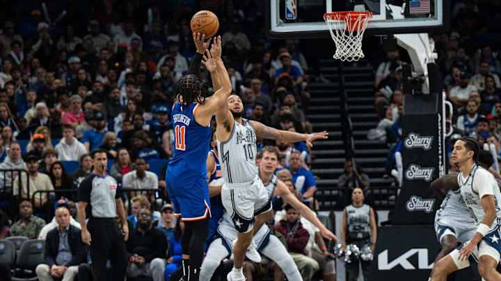 New York Knicks guard Jalen Brunson (11) shoots the ball over Orlando Magic guard Cory Joseph (10) in the third quarter at Kia Center.