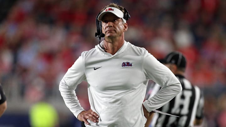 Nov 15, 2025; Oxford, Mississippi, USA; Mississippi Rebels head coach Lane Kiffin looks on during a time out during the first quarter against the Florida Gators at Vaught-Hemingway Stadium. Mandatory Credit: Petre Thomas-Imagn Images