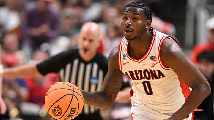 Mar 26, 2026; San Jose, CA, USA; Arizona Wildcats guard Jaden Bradley (0) dribbles the ball against the Arkansas Razorbacks in the first half during a Sweet Sixteen game of the West Regional of the men's 2026 NCAA Tournament at SAP Center. Mar 26, 2026; San Jose, CA, USA; Arizona Wildcats guard Jaden Bradley (0) dribbles the ball against the Arkansas Razorbacks in the first half during a Sweet Sixteen game of the West Regional of the men's 2026 NCAA Tournament at SAP Center.