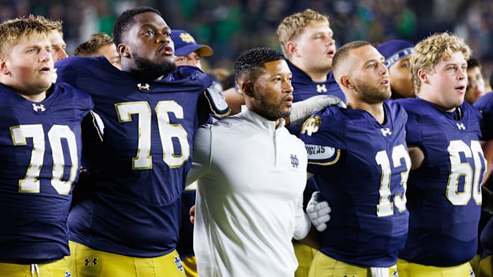 Notre Dame head coach Marcus Freeman celebrates with his players after winning a NCAA football game 56-30 against Purdue at Notre Dame Stadium on Saturday, Sept. 20, 2025, in South Bend.