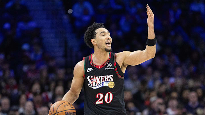 Dec 23, 2025; Philadelphia, Pennsylvania, USA; Philadelphia 76ers guard Jared McCain (20) controls the ball against the Brooklyn Nets during the third quarter at Xfinity Mobile Arena. Mandatory Credit: Bill Streicher-Imagn Images