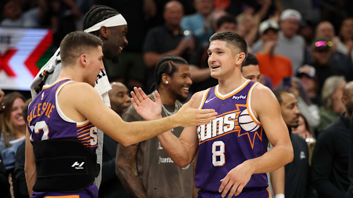 Nov 10, 2025; Phoenix, Arizona, USA; Phoenix Suns guard Grayson Allen (8) celebrates with Collin Gillespie after being pulled from the game after setting the franchise record for three pointers in a game against the New Orleans Pelicans in the second half at the Mortgage Matchup Center. Mandatory Credit: Mark J. Rebilas-Imagn Images