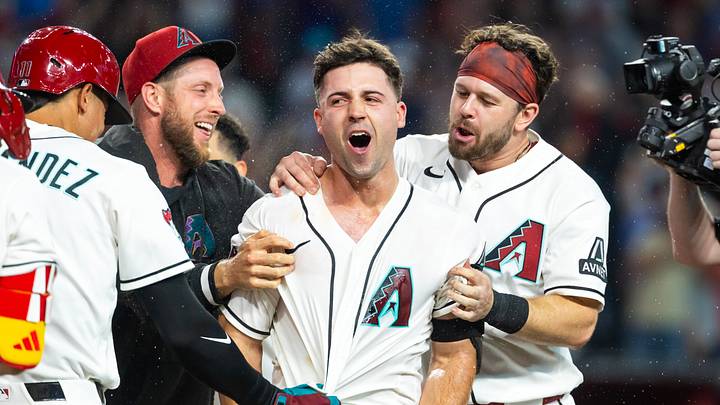 Aug 25, 2026; Phoenix, Arizona, USA; Arizona Diamondbacks pinch hitter Ryan Waldschmidt (right) celebrates with teammates Merrill Kelly and Tim Tawa after hitting a two run walk off home run in the ninth inning against the Chicago Cubs at Chase Field. Mandatory Credit: Mark J. Rebilas-Imagn Images Aug 25, 2026; Phoenix, Arizona, USA; Arizona Diamondbacks pinch hitter Ryan Waldschmidt (right) celebrates with teammates Merrill Kelly and Tim Tawa after hitting a two run walk off home run in the ninth inning against the Chicago Cubs at Chase Field. Mandatory Credit: Mark J. Rebilas-Imagn Images