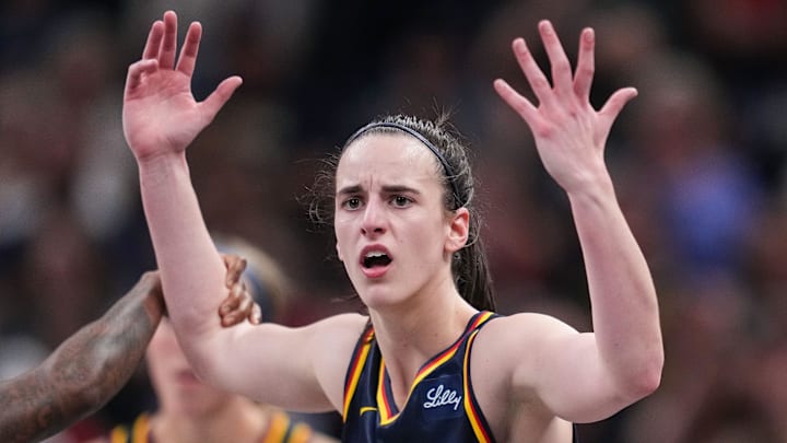 Indiana Fever guard Caitlin Clark (22) throws her hands up to the referee on Sunday, Sept. 15, 2024, during the game at Gainbridge Fieldhouse in Indianapolis. The Indiana Fever defeated the Dallas Wings, 110-109. Indiana Fever guard Caitlin Clark (22) throws her hands up to the referee on Sunday, Sept. 15, 2024, during the game at Gainbridge Fieldhouse in Indianapolis. The Indiana Fever defeated the Dallas Wings, 110-109.