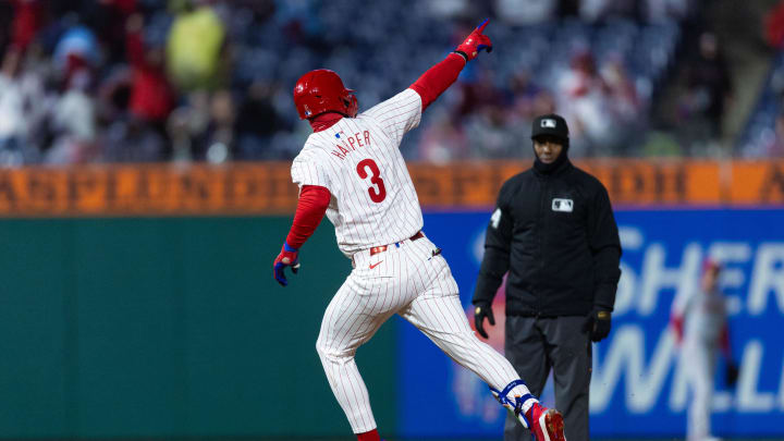 Apr 2, 2024; Philadelphia, Pennsylvania, USA; Philadelphia Phillies first baseman Bryce Harper (3) runs the bases after hitting his second home run of the game during the fourth inning against the Cincinnati Reds at Citizens Bank Park.