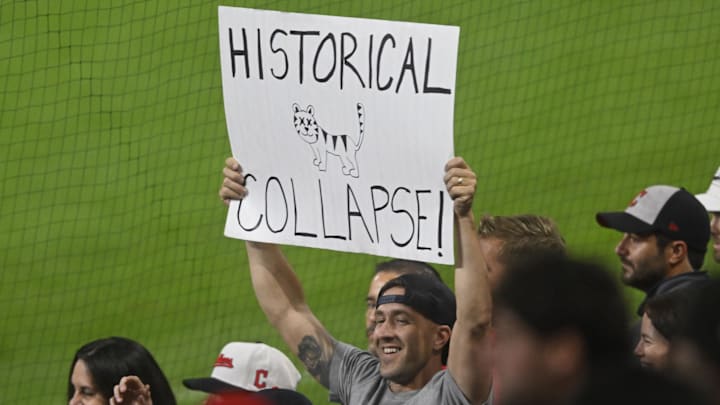 Sep 24, 2025; Cleveland, Ohio, USA; A fan holds a sign during a game between the Cleveland Guardians and the Detroit Tigers at Progressive Field. Mandatory Credit: David Richard-Imagn Images