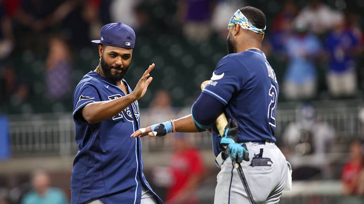 Sep 9, 2026; Atlanta, Georgia, USA; Tampa Bay Rays third baseman Junior Caminero (13) and designated hitter Yandy Diaz (2) celebrate after a victory over the Atlanta Braves at Truist Park. Mandatory Credit: Brett Davis-Imagn Images Sep 9, 2026; Atlanta, Georgia, USA; Tampa Bay Rays third baseman Junior Caminero (13) and designated hitter Yandy Diaz (2) celebrate after a victory over the Atlanta Braves at Truist Park. Mandatory Credit: Brett Davis-Imagn Images