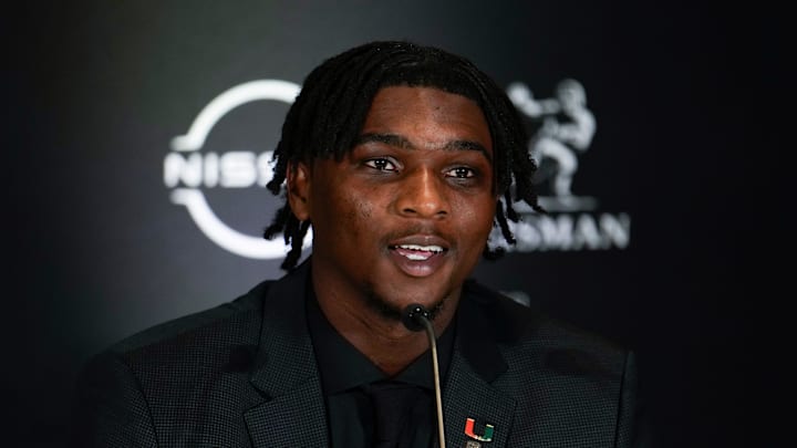 Dec 14, 2024; New York, NY, USA; Miami Hurricanes quarterback Cam Ward speaks on stage during a press conference before the 2024 Heisman Trophy Presentation. Mandatory Credit: Lucas Boland-Imagn Images