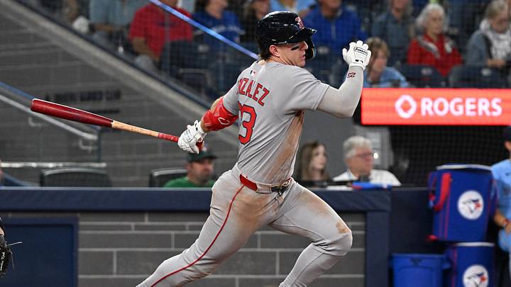 Sep 24, 2025; Toronto, Ontario, CAN;  Boston Red Sox second baseman Romy Gonzalez (23) hits a single against the Toronto Blue Jays in the eighth inning at Rogers Centre. Mandatory Credit: Dan Hamilton-Imagn Images