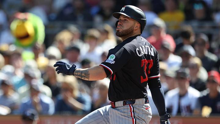 May 30, 2026; Pittsburgh, Pennsylvania, USA;  Minnesota Twins catcher Victor Caratini (37) hits an RBI double against the Pittsburgh Pirates during the second inning at PNC Park. Mandatory Credit: Charles LeClaire-Imagn Images