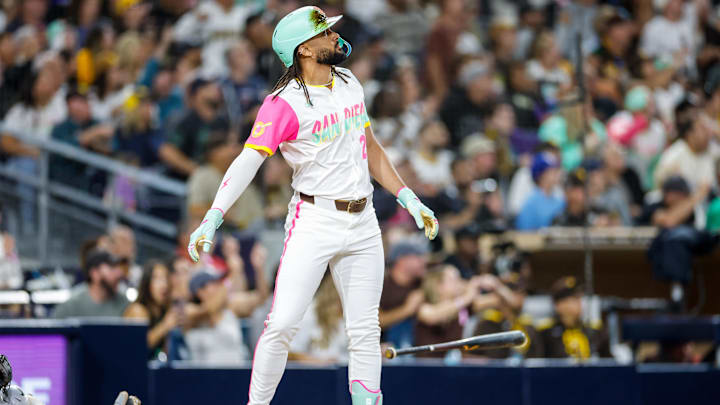 Fernando Tatis Jr. (23) hits a grand slam home run during the fourth inning Arizona Diamondbacks at Petco Park.