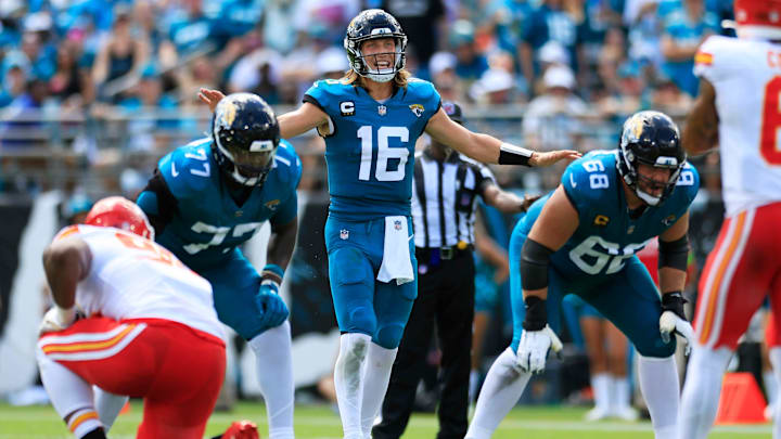 Jacksonville Jaguars quarterback Trevor Lawrence (16) calls a play during the second quarter of a