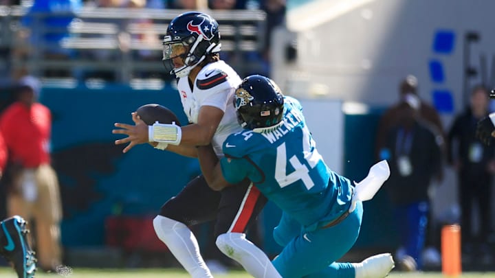 Jacksonville Jaguars defensive end Travon Walker (44) sacks Houston Texans quarterback C.J. Stroud (7) during the first quarter of an NFL football matchup Sunday, Dec. 1, 2024 at EverBank Stadium in Jacksonville, Fla. Jacksonville Jaguars defensive end Travon Walker (44) sacks Houston Texans quarterback C.J. Stroud (7) during the first quarter of an NFL football matchup Sunday, Dec. 1, 2024 at EverBank Stadium in Jacksonville, Fla.