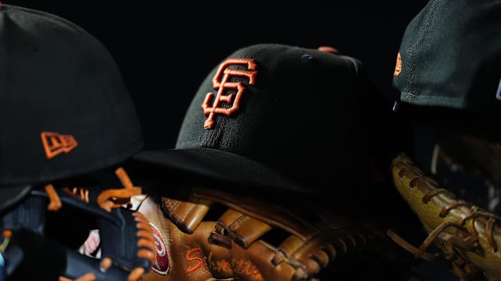 General view of San Francisco Giants caps and gloves during the sixth inning against the Colorado Rockies at Coors Field. General view of San Francisco Giants caps and gloves during the sixth inning against the Colorado Rockies at Coors Field.