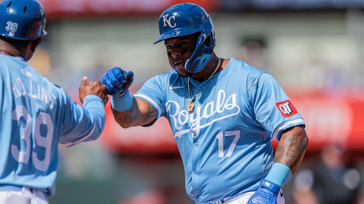 Apr 7, 2024; Kansas City, Missouri, USA; Kansas City Royals outfielder Nelson Velázquez (17) fist bumps Kansas City Royals first base coach Damon Hollins (39) during the fifth inning after a hit against the Chicago White Sox at Kauffman Stadium. Mandatory Credit: William Purnell-Imagn Images