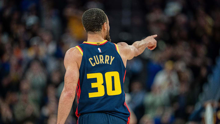 Mar 15, 2025; San Francisco, California, USA; Golden State Warriors guard Stephen Curry (30) celebrates after the basket against the New York Knicks during the fourth quarter at Chase Center. Mandatory Credit: Neville E. Guard-Imagn Images