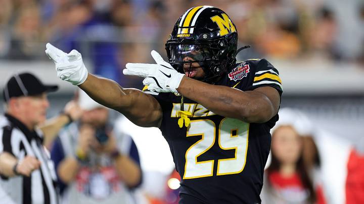 Missouri Tigers running back Ahmad Hardy (29) reacts to his first down pickup during the first quarter of the TaxSlayer Gator Bowl at EverBank Stadium, Saturday, Dec. 27, 2025, in Jacksonville. Fla. [Corey Perrine/Florida Times-Union]