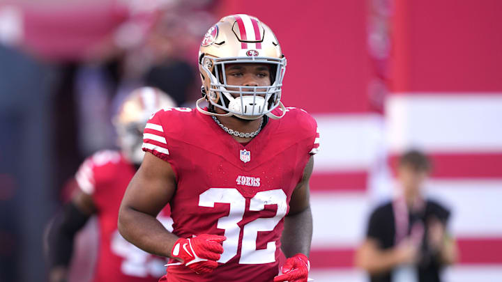 Oct 8, 2023; Santa Clara, California, USA; San Francisco 49ers running back Tyrion Davis-Price (32) jogs on the field before the game against the Dallas Cowboys at Levi's Stadium. Mandatory Credit: Darren Yamashita-Imagn Images