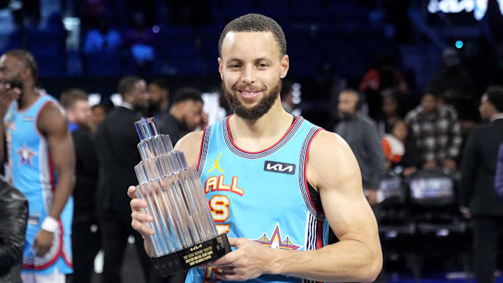 Feb 16, 2025; San Francisco, CA, USA; Shaq’s OGs guard Stephen Curry (30) of the Golden State Warriors celebrates with the MVP trophy after defeating Chuck’s Global Stars during the 2025 NBA All Star Game at Chase Center. Mandatory Credit: Kyle Terada-Imagn Images