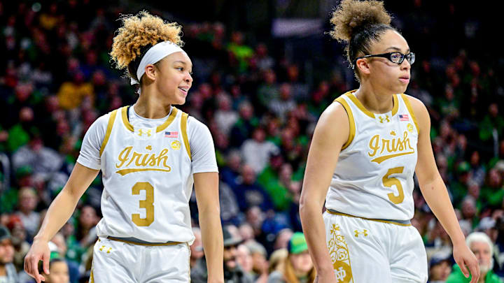 Feb 17, 2025; South Bend, Indiana, USA; Notre Dame Fighting Irish guard Hannah Hidalgo (3) and guard Olivia Miles (5) pause in the first half against the Duke Blue Devils at the Purcell Pavilion. 