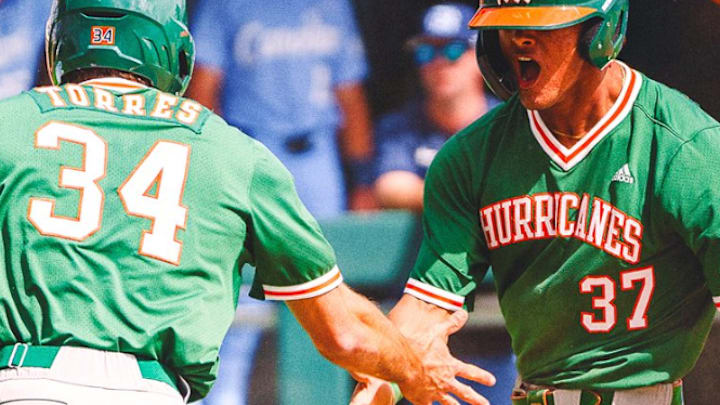 Freshman Michael Torres (34) and Fabio Peralta (37) celebrating after bringing in the winning runs for the Hurricanes against No. 21 North Carolina 