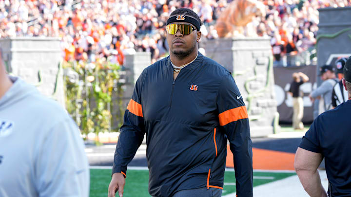 Orlando Brown Jr. walks on the field as he misses the game with an injury in the first quarter of the NFL Week 9 game between the Cincinnati Bengals and the Las Vegas Raiders at Paycor Stadium in downtown Cincinnati on Sunday, Nov. 3, 2024. Orlando Brown Jr. walks on the field as he misses the game with an injury in the first quarter of the NFL Week 9 game between the Cincinnati Bengals and the Las Vegas Raiders at Paycor Stadium in downtown Cincinnati on Sunday, Nov. 3, 2024.