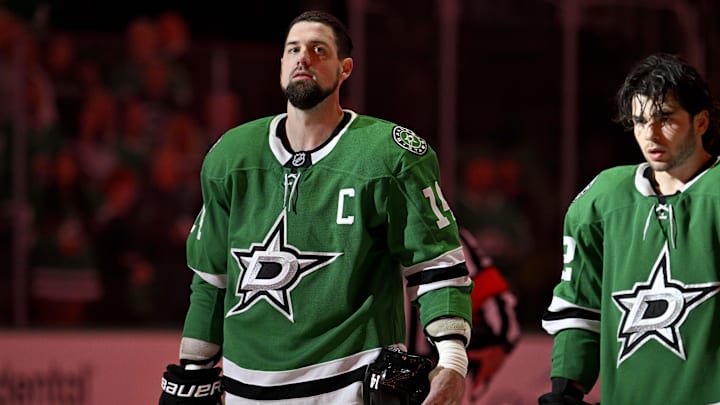 Apr 8, 2025; Dallas, Texas, USA; Dallas Stars left wing Jamie Benn (14) stands on the ice before the game against the Vancouver Canucks at the American Airlines Center. Mandatory Credit: Jerome Miron-Imagn Images