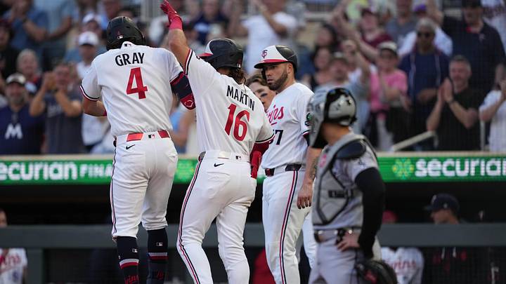 Jun 1, 2026; Minneapolis, Minnesota, USA; Minnesota Twins shortstop Tristan Gray (4) celebrates with right fielder Austin Martin (16) after hitting a grand slam during the fourth inning against the Chicago White Sox at Target Field. Jun 1, 2026; Minneapolis, Minnesota, USA; Minnesota Twins shortstop Tristan Gray (4) celebrates with right fielder Austin Martin (16) after hitting a grand slam during the fourth inning against the Chicago White Sox at Target Field.