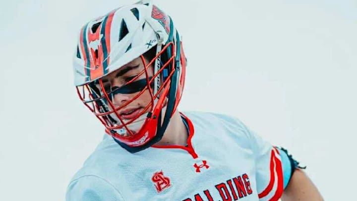 Archbishop Spalding's Trevor Brewer has committed to Queens University in Charlotte.