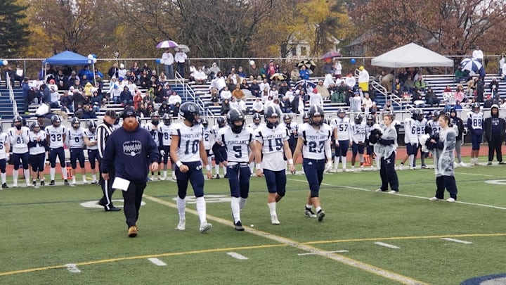 Portland Bulldogs walking up at the 2023 Maine high school football state championships. 