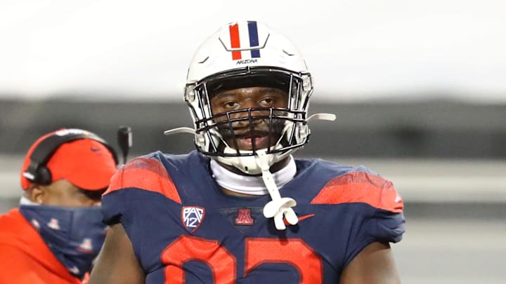 Dec 11, 2020; Tucson, Arizona, USA; Arizona Wildcats defensive tackle Kyon Barrs (92) against the Arizona State Sun Devils during the Territorial Cup at Arizona Stadium. Mandatory Credit: Mark J. Rebilas-Imagn Images