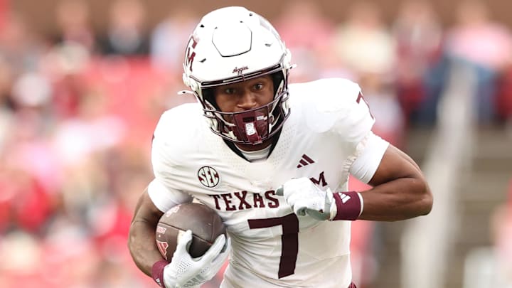 Texas A&M Aggies wide receiver KC Concepcion (7) runs after a catch during the first quarter against the Arkansas Razorbacks at Donald W. Reynolds Razorback Stadium. Texas A&M Aggies wide receiver KC Concepcion (7) runs after a catch during the first quarter against the Arkansas Razorbacks at Donald W. Reynolds Razorback Stadium.