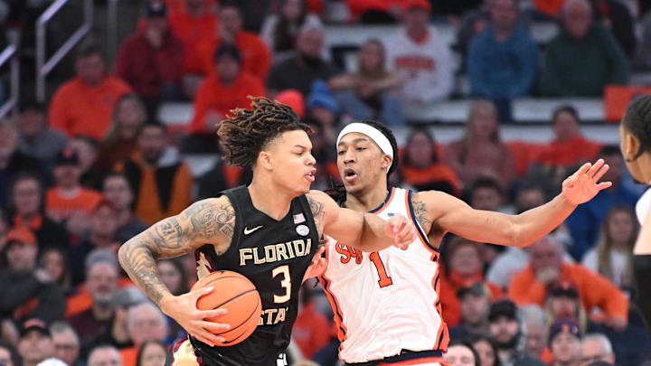 Jan 23, 2024; Syracuse, New York, USA; Florida State Seminoles forward Cam Corhen (3) drives the