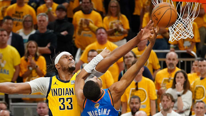 Jun 13, 2025; Indianapolis, Indiana, USA; Indiana Pacers center Myles Turner (33) blocks the shot of Oklahoma City Thunder guard Aaron Wiggins (21) during the first half during game four of the 2025 NBA Finals at Gainbridge Fieldhouse. Mandatory Credit: Kyle Terada-Imagn Images